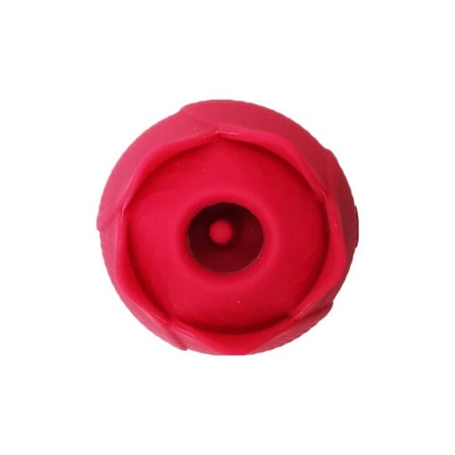 succionador de clitoris en forma de rosa plano cenital donde se ve que tiene una lengua dentro de la boquilla